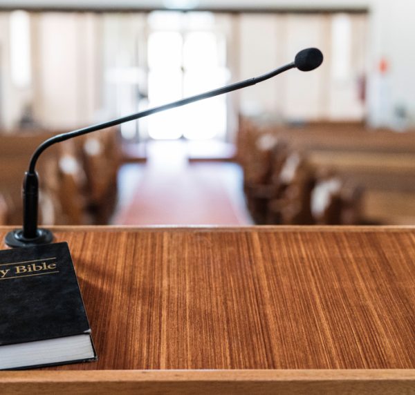 Bible,On,Pulpit,In,Church,,With,Light,Coming,In,Through